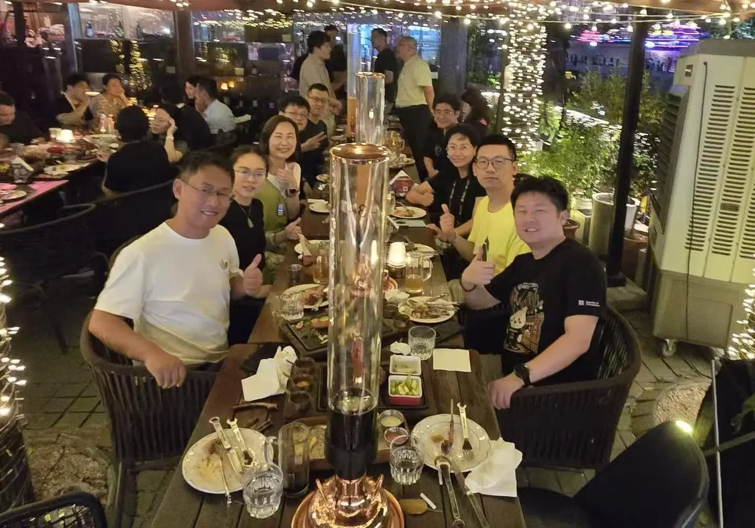Figure 3: Dinner with friends in Lujiazui, Shanghai, during KubeCon China 2026