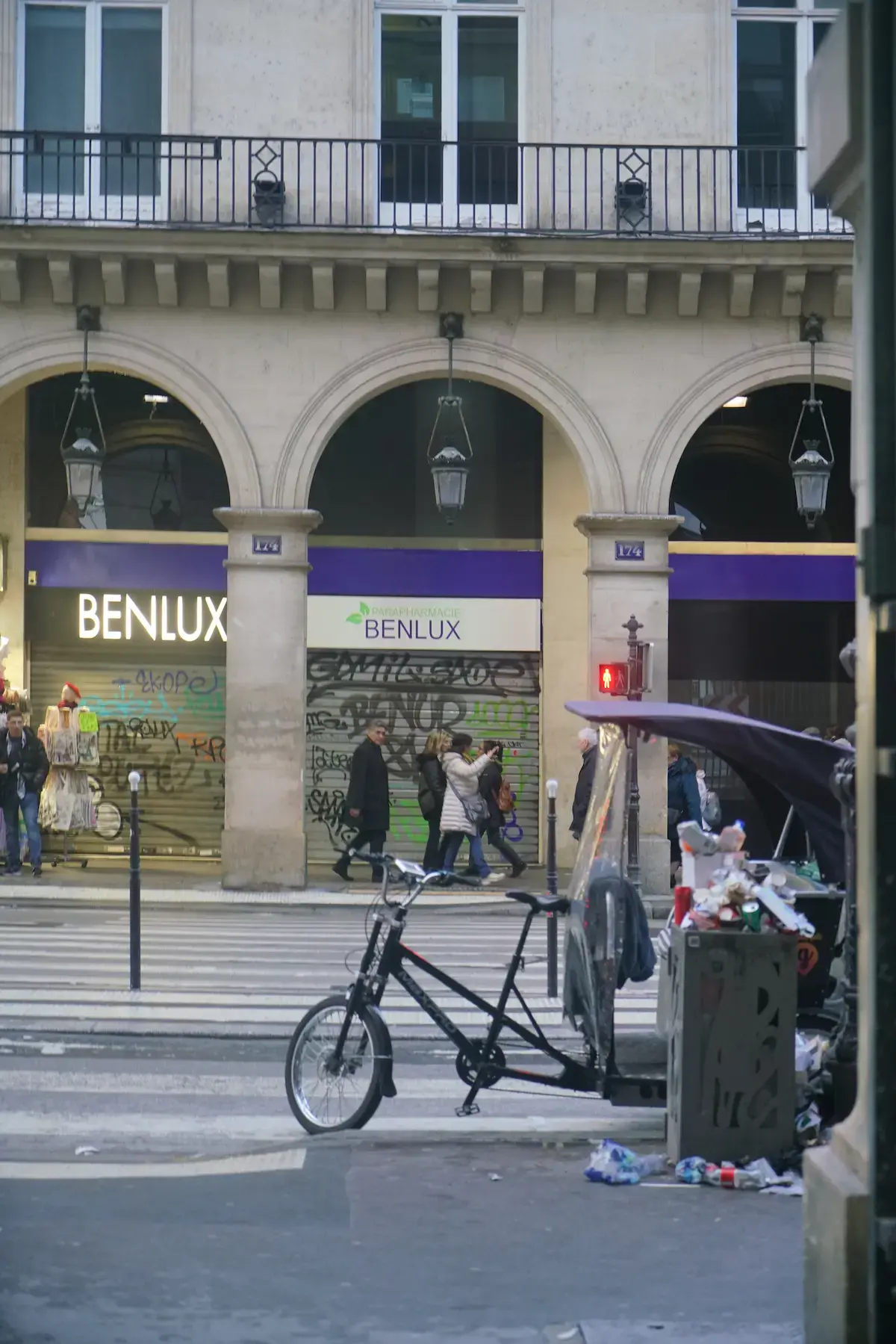 Street near the Louvre filled with trash and urine smell